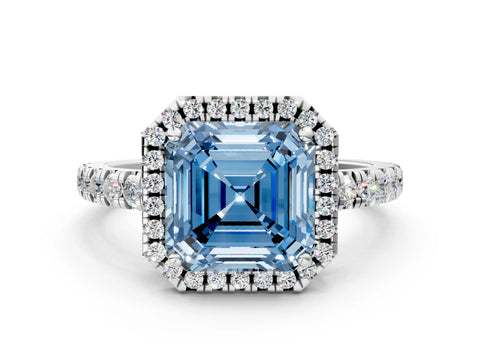 White gold Fancy Blue Asscher Cut Diamond Halo Ring with Pavé Band and Four-Prong Setting