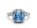 White gold Fancy Blue Asscher Cut Diamond Scalloped Halo Engagement Ring with Round Shared Prong Band_12