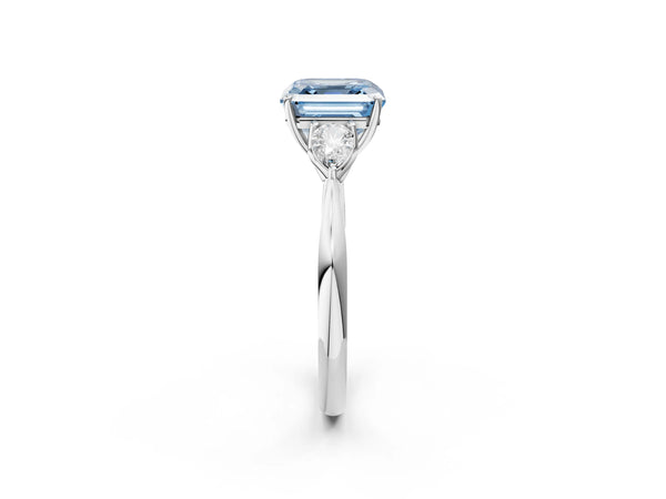 White gold Fancy Blue Asscher Cut Diamond Three-Stone Ring with Pear Side Stones and Prong Setting