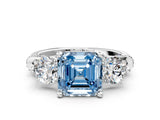White gold Fancy Blue Asscher Cut Diamond Three-Stone Ring with Prong Setting and Pavé Band