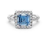 White gold Fancy Blue Asscher Cut Halo Diamond Solitaire with Filigree Band and Four-Prong Setting