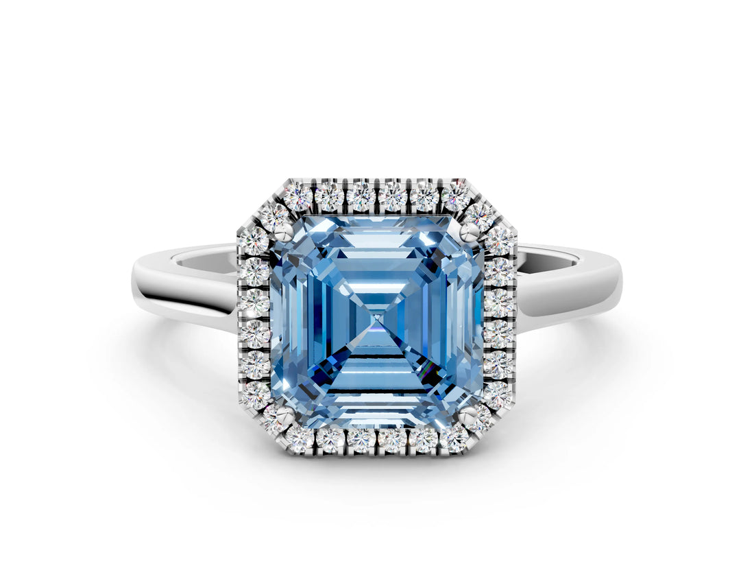White gold Fancy Blue Asscher Cut Halo Round Diamond Solitaire Ring with Pavé Band and Four-Prong Setting