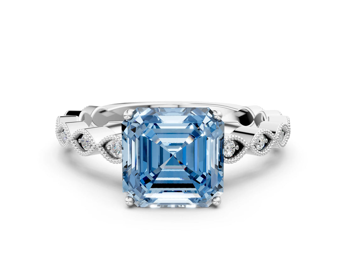 White gold Fancy Blue Asscher Cut Solitaire Diamond Ring with Infinity Twist Band and Four-Prong Setting