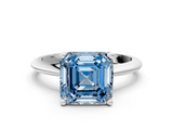 White gold Fancy Blue Asscher  Cut Solitaire Ring with Four-Prong Setting on a Classic Band