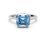 White gold Fancy Blue Asscher Cut Solitaire Split Shank Pave Diamond Engagement Ring with Four-Prong Setting