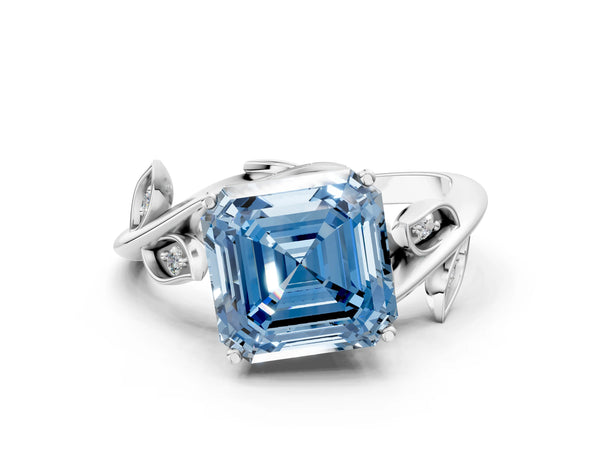 White gold Fancy Blue Asscher Cut Solitaire Twist Engagement Ring with Leaf Accents and Prong Setting