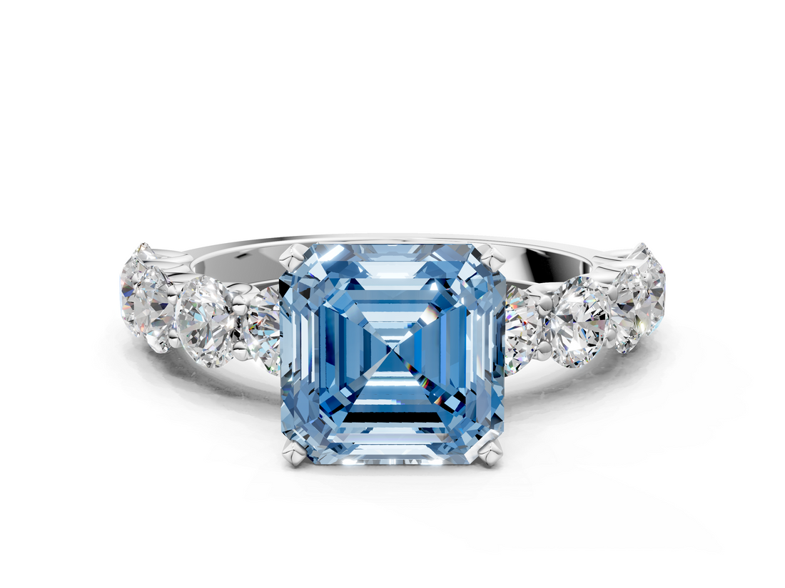 White gold Fancy Blue Asscher  Diamond Prong Setting with Side Stones on a Pave Band