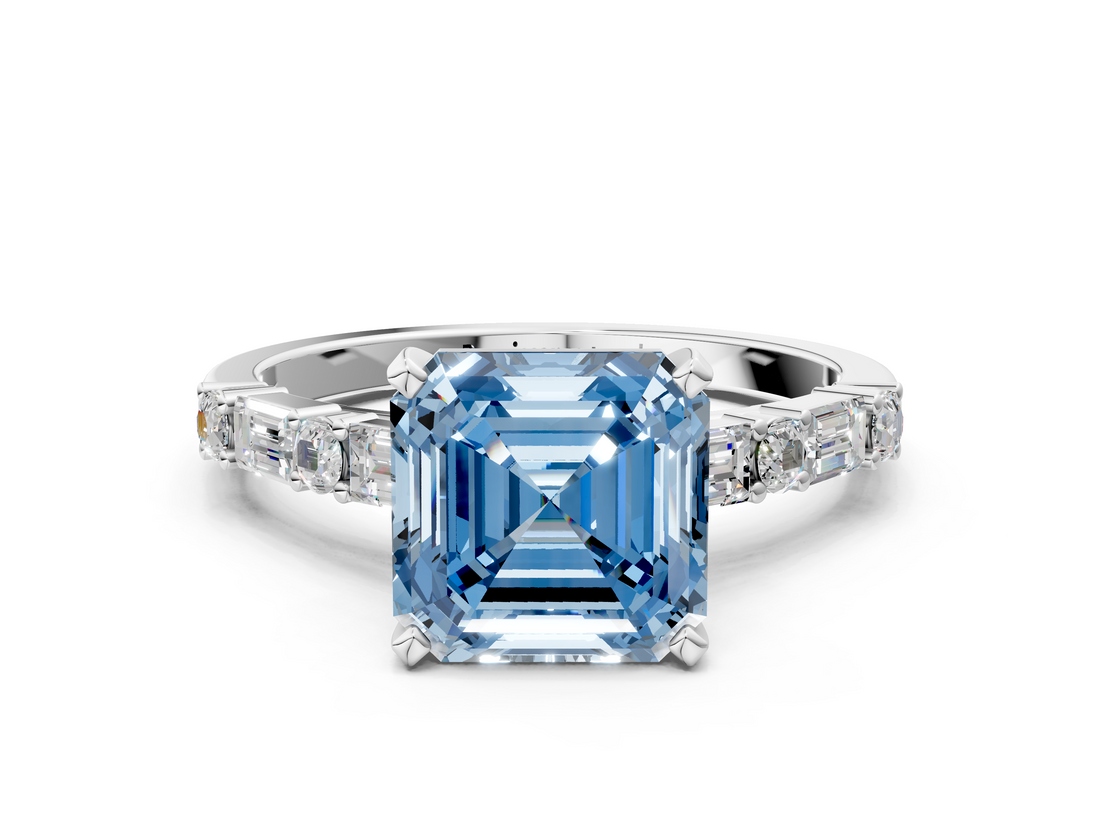 White gold Fancy Blue Asscher  Solitaire with Side Baguettes and Channel Set Band