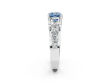 White gold Fancy Blue Cushion  Brilliant Solitaire with Side Stones on a Pave Band and Four-Prong Setting_63