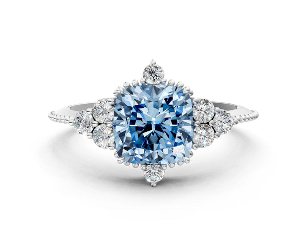 Platinum Fancy Blue Cushion Cut Brilliant Diamond with Cluster Setting on a Beaded Band and Four-Prong Setting