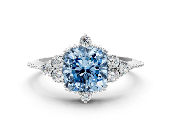 Platinum Fancy Blue Cushion Cut Brilliant Diamond with Cluster Setting on a Beaded Band and Four-Prong Setting