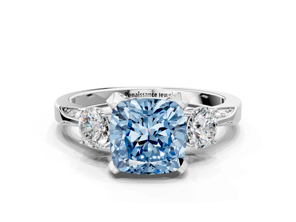 White gold Fancy Blue Cushion Cut Brilliant Three-Stone Diamond Ring with Pavé Band and Four-Prong Setting