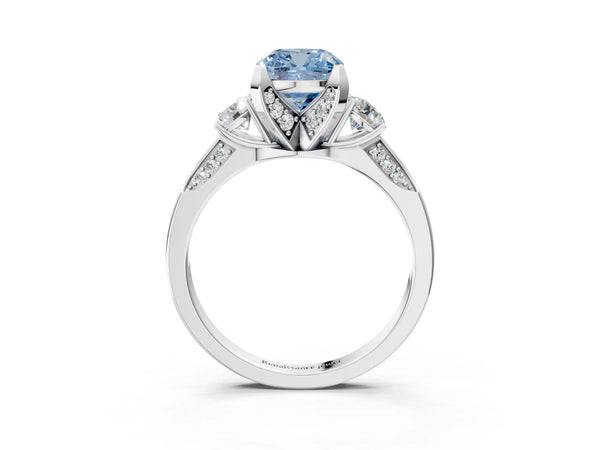 White gold Fancy Blue Cushion Cut Brilliant Three-Stone Diamond Ring with Pavé Band and Four-Prong Setting