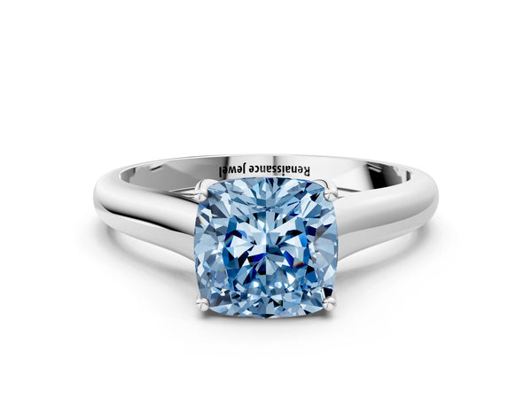 White gold Fancy Blue Cushion Cut Cut Diamond Solitaire Engagement Ring with Tapered Plain Band and Four-Prong Setting