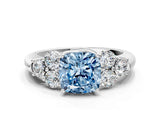 White gold Fancy Blue Cushion  Cut Diamond Cluster Ring with Round Accent Stones and Prong Setting on a Classic Band_49