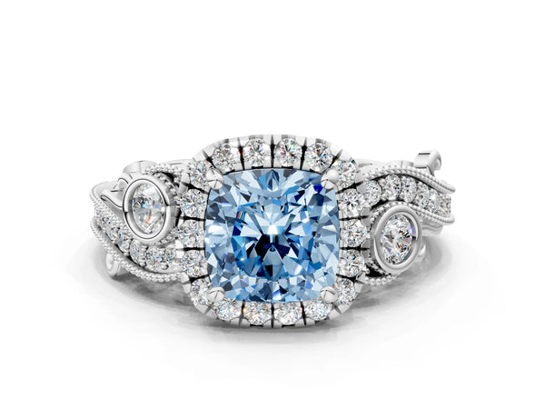 White gold Fancy Blue Cushion Cut Diamond Halo Ring with Milgrain Pavé Band and Four-Prong Setting