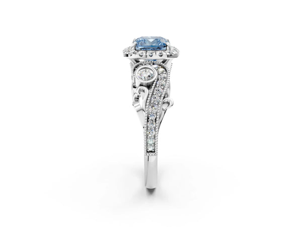 White gold Fancy Blue Cushion Cut Diamond Halo Ring with Milgrain Pavé Band and Four-Prong Setting