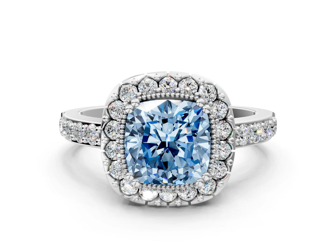 White gold Fancy Blue Cushion Cut Diamond Halo Ring with Pavé Band and Prong Setting