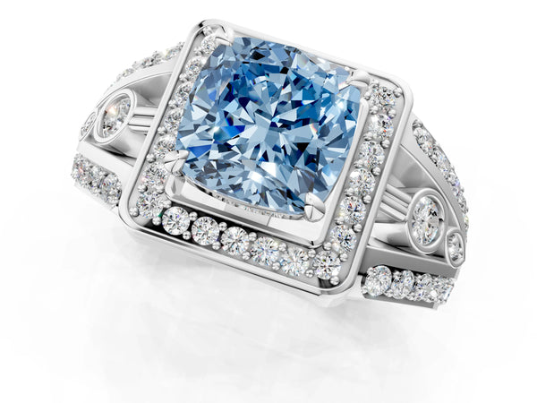 White gold Fancy Blue Cushion Cut Diamond Halo Ring with Split Shank and Bezel Accents and Four-Prong Setting