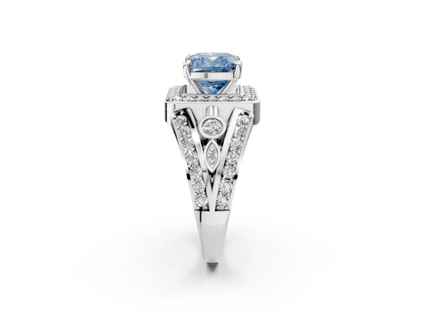 White gold Fancy Blue Cushion Cut Diamond Halo Ring with Split Shank and Bezel Accents and Four-Prong Setting
