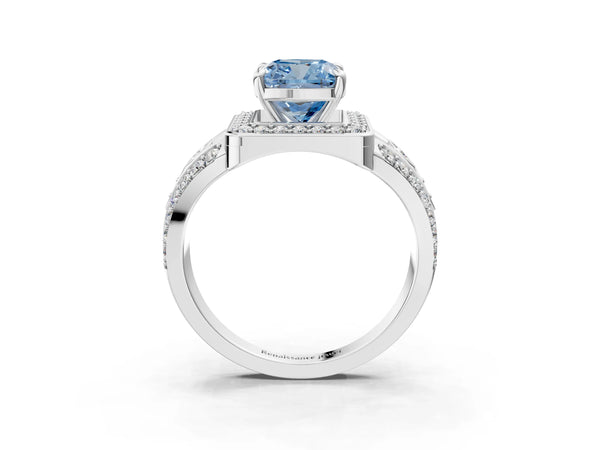 White gold Fancy Blue Cushion Cut Diamond Halo Ring with Split Shank and Bezel Accents and Four-Prong Setting