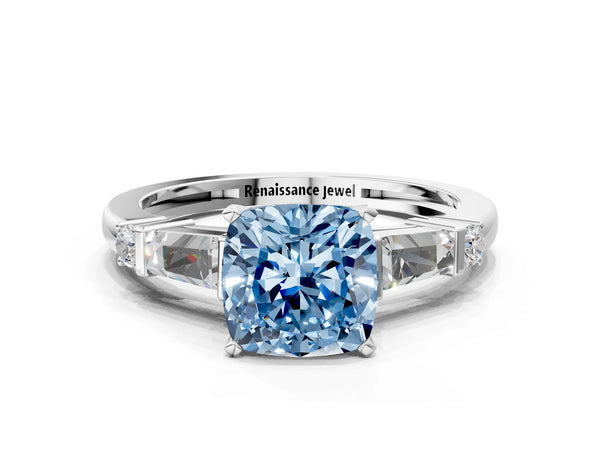 White gold Fancy Blue Cushion  Cut Diamond Ring with Baguette Side Stones, Channel Set Band, and Four-Prong Setting