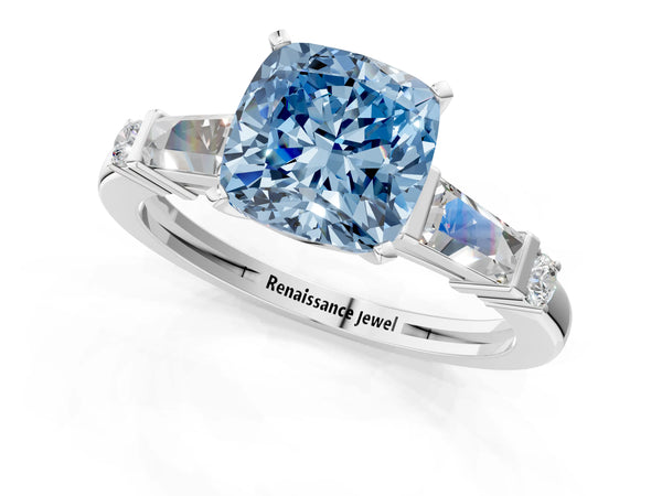 White gold Fancy Blue Cushion  Cut Diamond Ring with Baguette Side Stones, Channel Set Band, and Four-Prong Setting