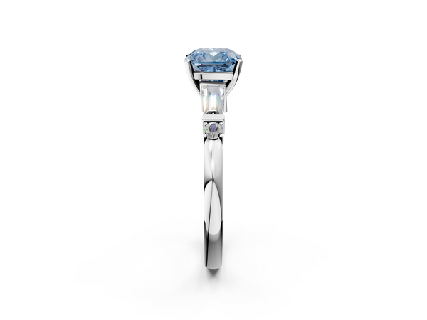 White gold Fancy Blue Cushion  Cut Diamond Ring with Baguette Side Stones, Channel Set Band, and Four-Prong Setting