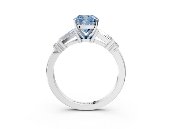 White gold Fancy Blue Cushion  Cut Diamond Ring with Baguette Side Stones, Channel Set Band, and Four-Prong Setting