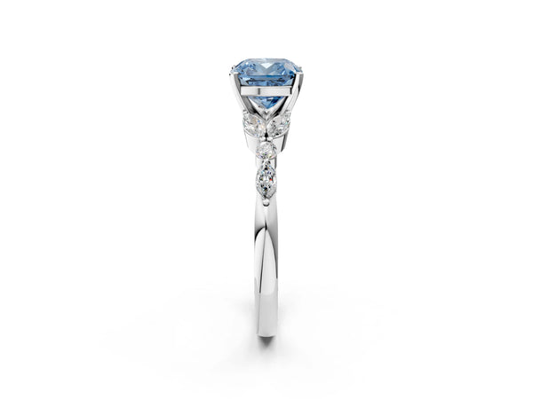 White gold Fancy Blue Cushion Cut Diamond Solitaire Ring with Side Stones and Four-Prong Setting