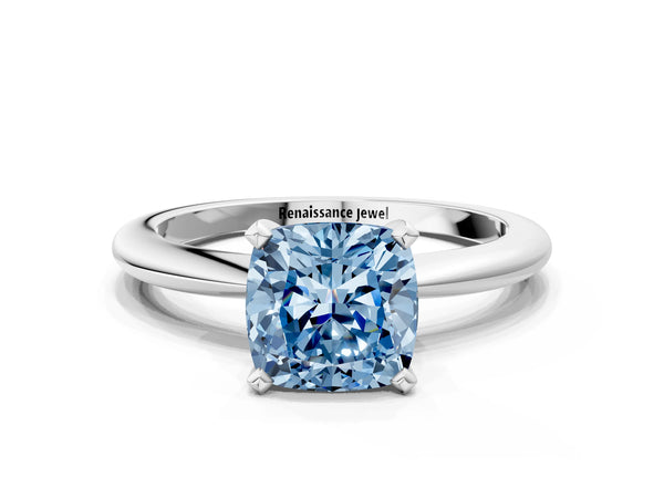Platinum Fancy Blue Cushion Cut Diamond Solitaire Ring with Six-Prong Setting and Classic Band