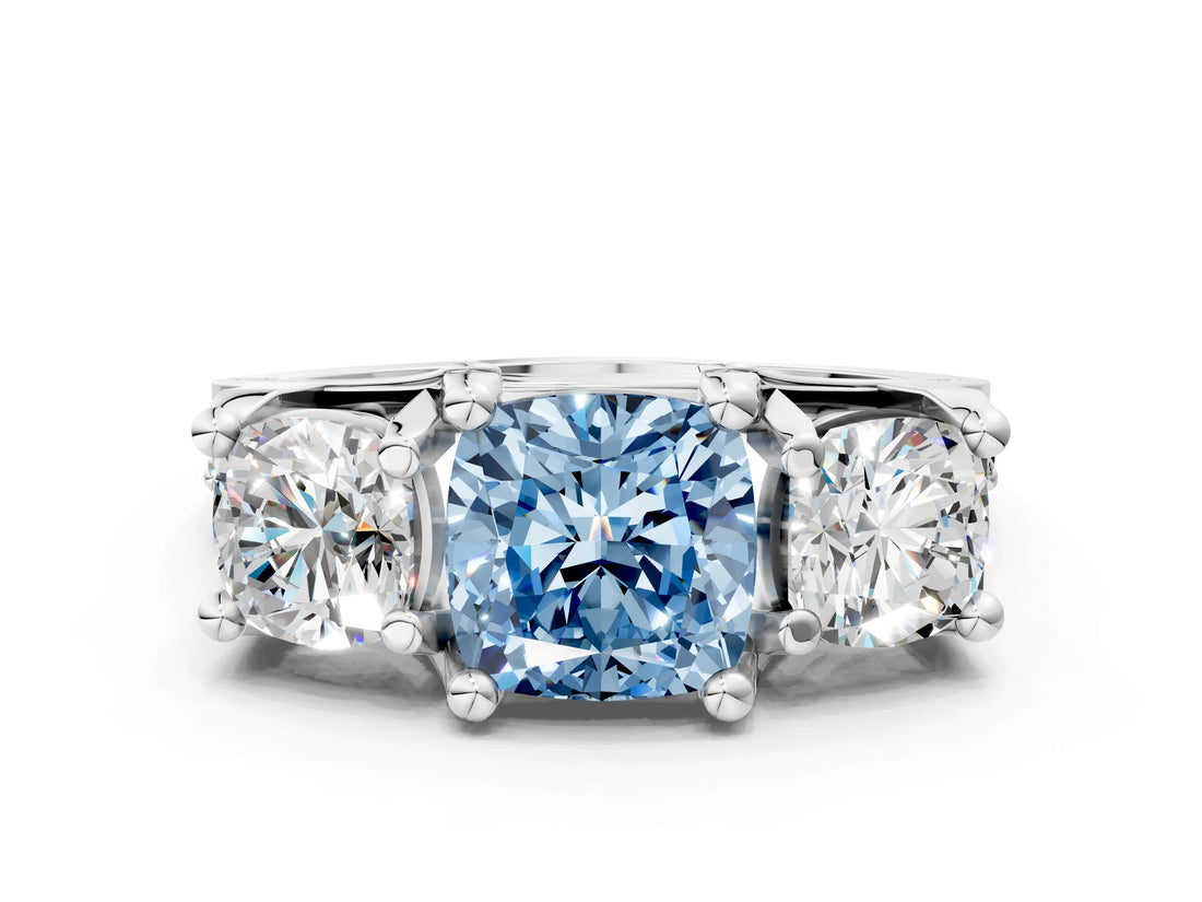 White gold Fancy Blue Cushion Cut Diamond Three-Stone Ring with Channel Set Band and Four-Prong Setting_84