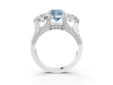White gold Fancy Blue Cushion Cut Diamond Three-Stone Ring with Channel Set Band and Four-Prong Setting_89