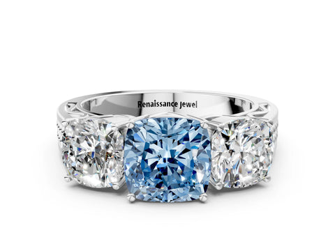 White gold Fancy Blue Cushion Cut Diamond Three-Stone Ring with Prong Setting and Textured Band