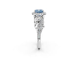 White gold Fancy Blue Cushion Cut Halo Diamond Ring with Milgrain and Bezel Accents on a Split Shank Band_14