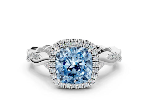 White gold Fancy Blue Cushion Cut Halo Twist Band with Four-Prong Setting