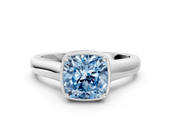 White gold Fancy Blue Cushion Cut Solitaire Diamond Engagement Ring with Four-Prong Setting and Tapered Band