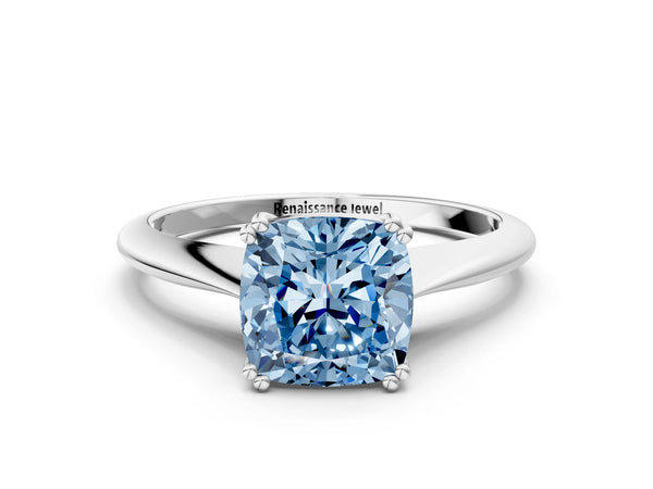White gold Fancy Blue Cushion Cut Solitaire Diamond Ring with Six-Prong Setting and Classic Band