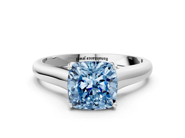 Platinum Fancy Blue Cushion Cut Solitaire Engagement Ring with Tapered Band and Four-Prong Setting