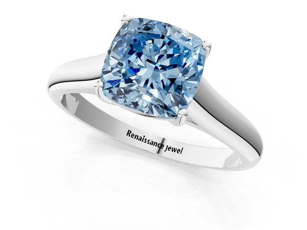 Platinum Fancy Blue Cushion Cut Solitaire Engagement Ring with Tapered Band and Four-Prong Setting