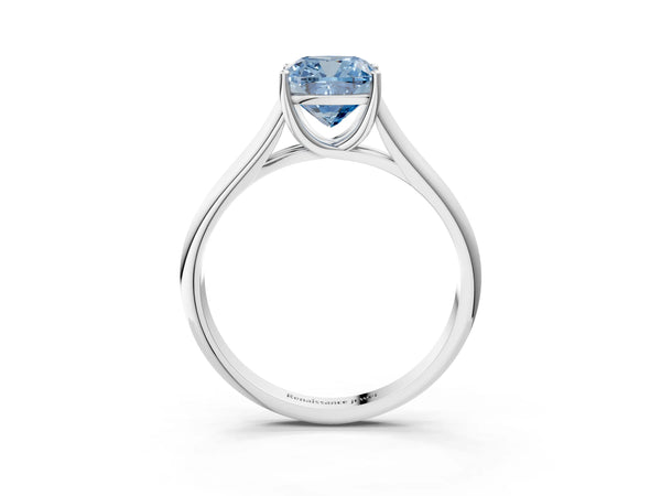 Platinum Fancy Blue Cushion Cut Solitaire Engagement Ring with Tapered Band and Four-Prong Setting