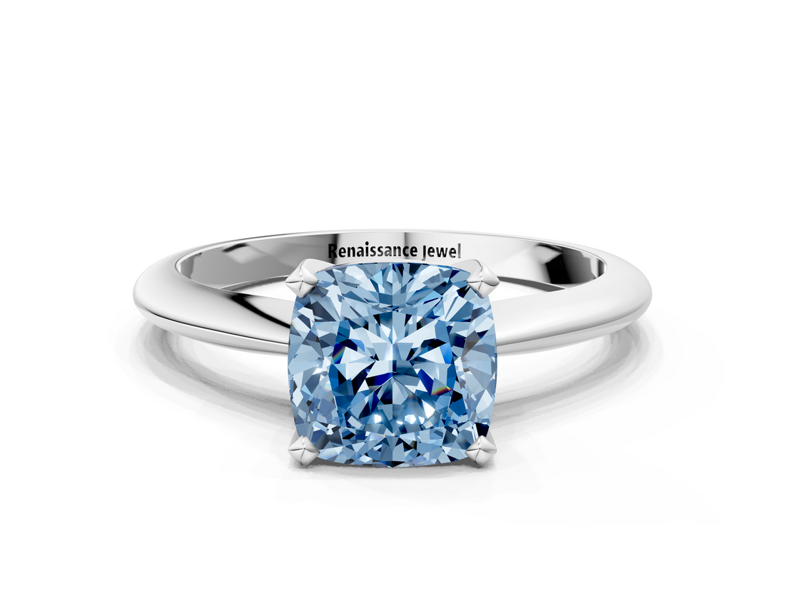 White gold Fancy Blue Cushion  Cut Solitaire Ring with Four-Prong Setting on a Classic Band_83