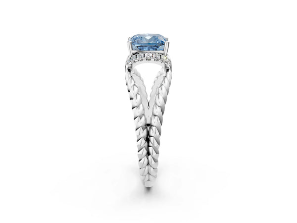 Platinum Fancy Blue Cushion  Halo Twisted Band Four-Prong Ring