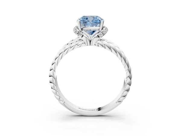 Platinum Fancy Blue Cushion  Halo Twisted Band Four-Prong Ring