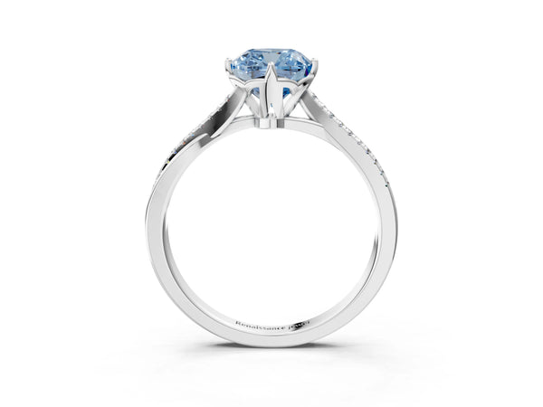 White gold Fancy Blue Cushion  Solitaire Twist Band with Pavé Diamonds and Four-Prong Setting