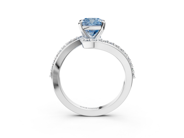 White gold Fancy Blue Cushion  Solitaire Twist Band with Pave Set Diamonds and Four-Prong Setting