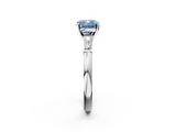 White gold Fancy Blue Cushion  Solitaire with Tapered Baguette Side Stones on a Classic Band with Four-Prong Setting_135