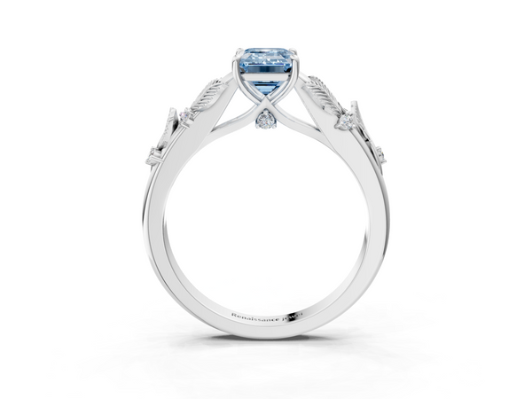 White gold Fancy Blue Emerald Cut Diamond Solitaire Ring with Leaf Motif Band and Four-Prong Setting