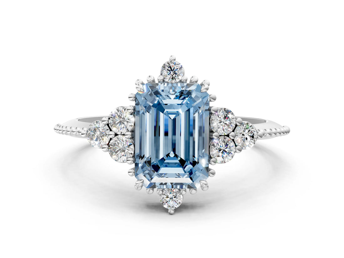 White gold Fancy Blue Emerald Cut Brilliant Diamond with Cluster Setting on a Beaded Band and Four-Prong Setting_24