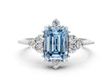 White gold Fancy Blue Emerald Cut Brilliant Diamond with Cluster Setting on a Beaded Band and Four-Prong Setting_24